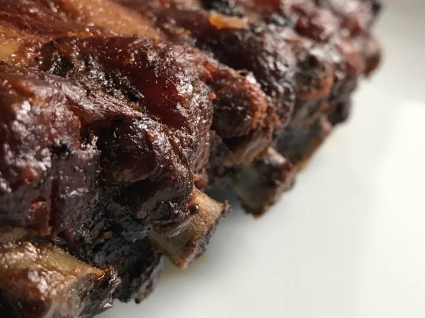istock Grilled meat on a white plate, close up 1081661070