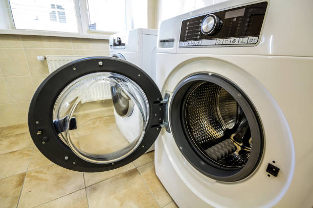 istock A close up of open washing machine in bathroom 1081664706