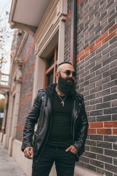 istock Biker walking on the street 1081664824