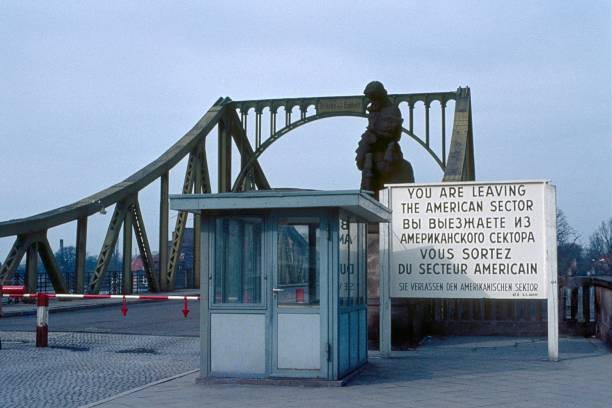 open gate at former border between East and West - looking from the East to the West through the Iron Curtain of the Cold War