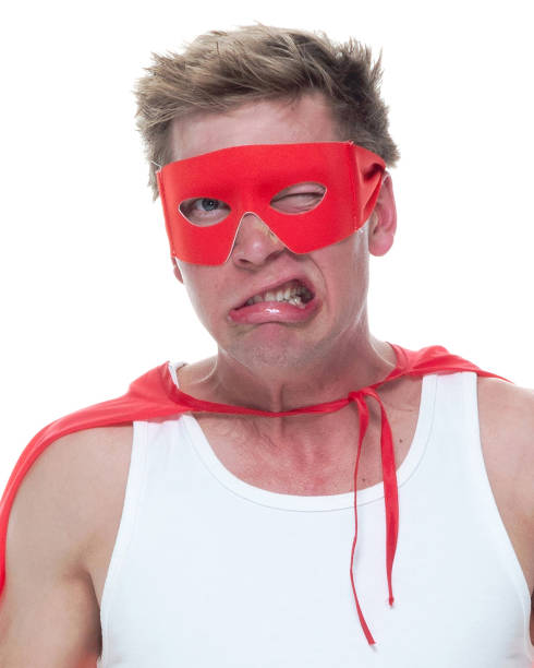 istock Man wearing pajamas and super hero cape 1081675340