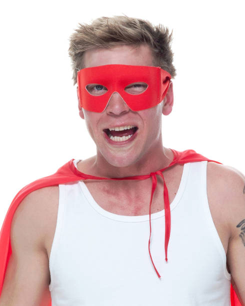istock Man wearing pajamas and super hero cape 1081675350