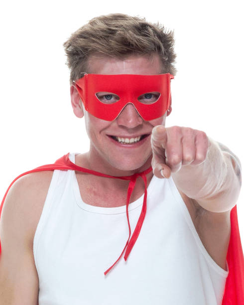 istock Man wearing pajamas and super hero cape 1081676392