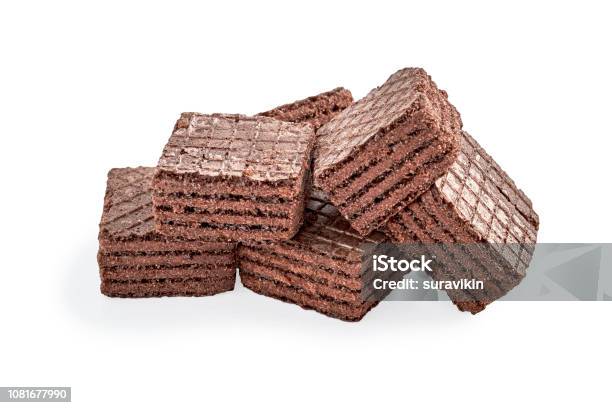 Pile Of Chocolate Square Brownie Wafer Biscuits Isolated On White Stock Photo - Download Image Now