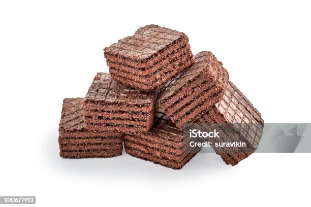Heap Of Chocolate Square Brownie Wafer Biscuits Isolated On White Stock Photo - Download Image Now
