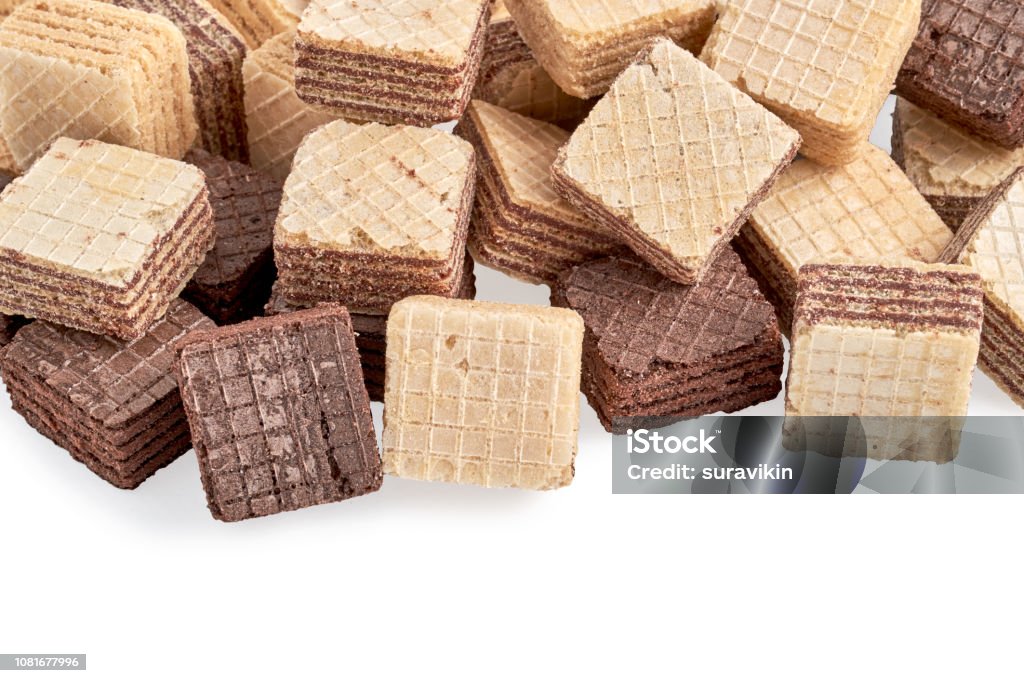 heap of square wafer biscuits isolated on white heap of square wafer biscuits isolated on white background. Top view Above Stock Photo