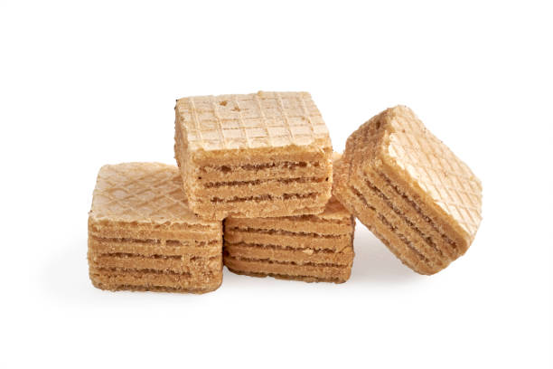 istock pile of chocolate square honey wafer biscuits isolated on white 1081678004