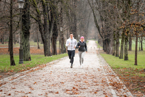 istock Athlete couple running outdoors 1081679590