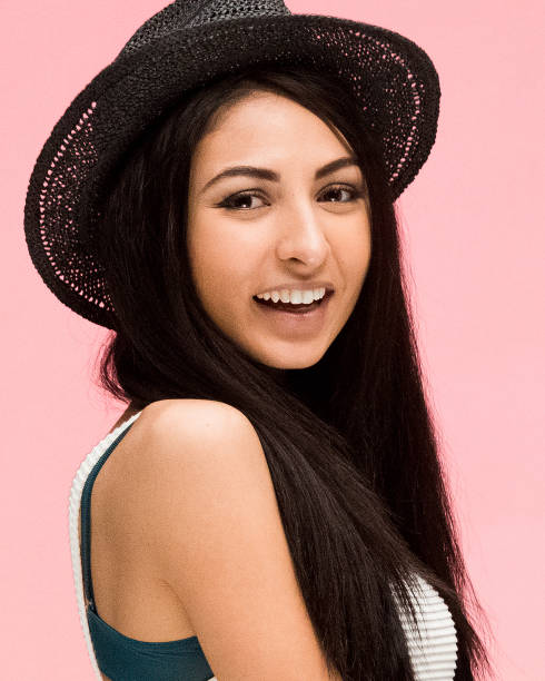istock Beautiful female on pink background 1081683004