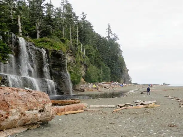 Photo of Evening along the beaches of the West Coast Trail at the Tsusiat Falls Campsite.  This is one of the most legendary hikes in British Columbia, Canada, and the world.