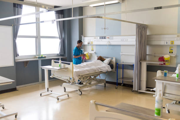 istock Nurse assessing a senior patient 1081685180