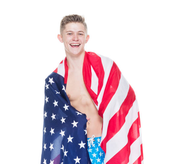 istock Handsome shirtless man wearing American themed shorts 1081688100