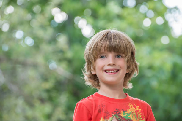 istock Portrait of a boy with blurred background 1081688918