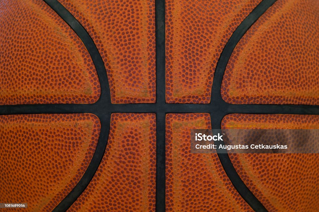 Closeup detail of basketball ball texture background Basketball - Sport Stock Photo