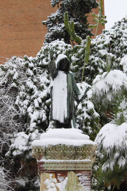 Cola di Rienzo statue in Campidoglio square under snow in Rome