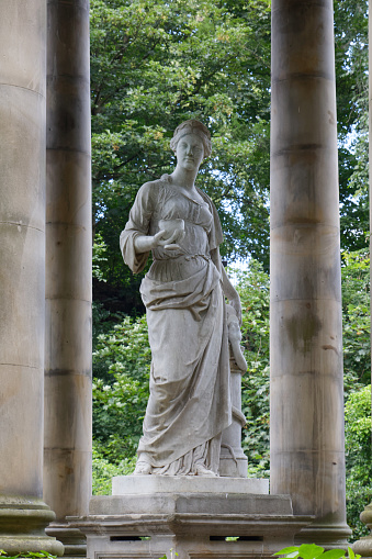 Edinburgh, Scotland, UK - August 5: The statue of the Goddess Hygieia stands atop St. Bernard's Well along the Water of Leith.
