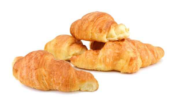 istock Fresh and tasty croissant over white background 1081711532