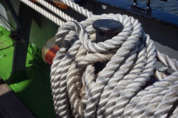 Steel belaying pins with ropes on a sailing ship. Steel belaying pins with ropes on a sailing ship. krusenstern stock pictures, royalty-free photos & images