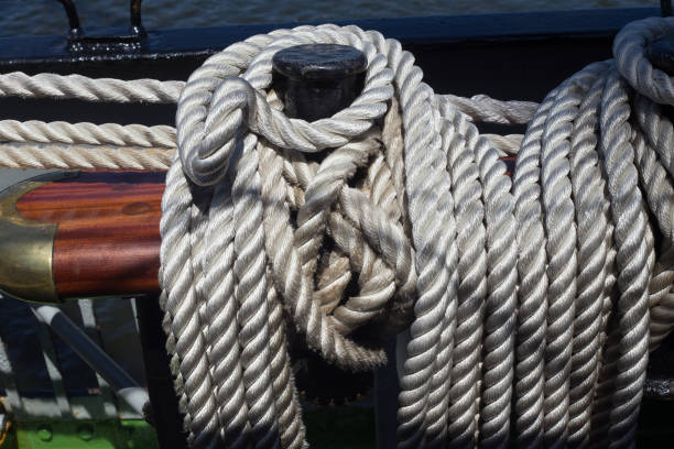 Steel belaying pins with ropes on a sailing ship. Steel belaying pins with ropes on a sailing ship. krusenstern stock pictures, royalty-free photos & images