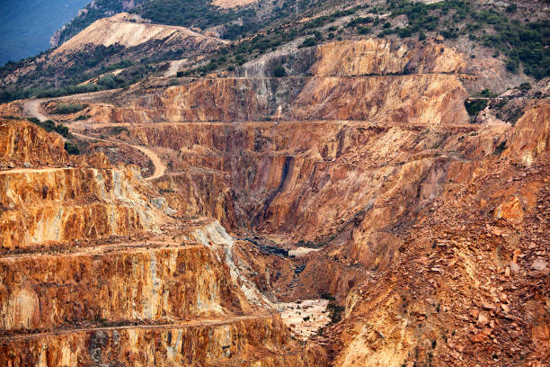 Abandoned Copper Mine View of abandoned open cut Copper mine pitView of abandoned open cut Copper mine pit lead mine stock pictures, royalty-free photos & images