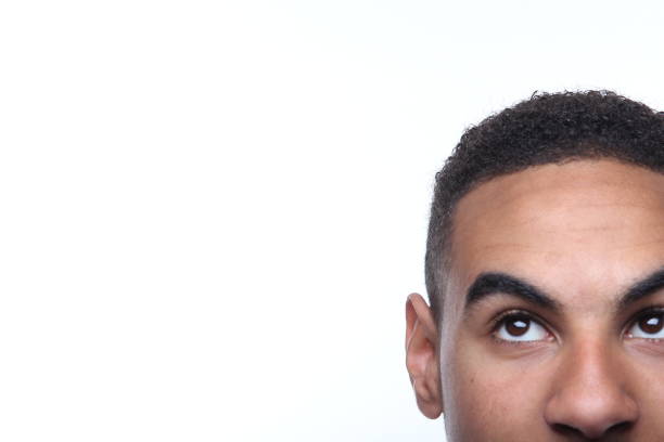 Studio Shot Of Man Against White Background
