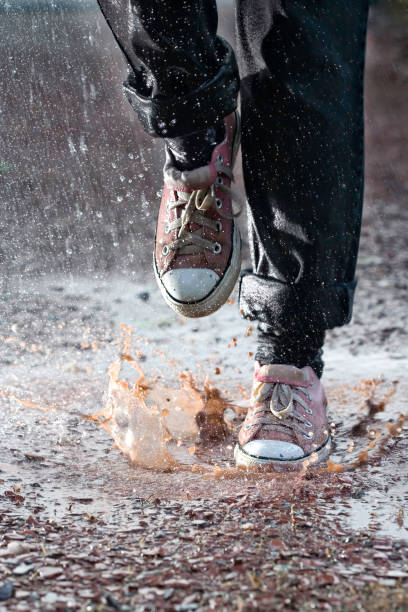 Raindrops in a puddle.