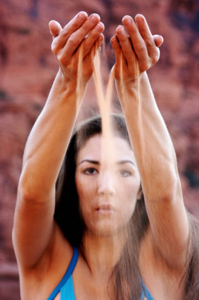 istock Woman Holding Arms Out with Sand 108174025