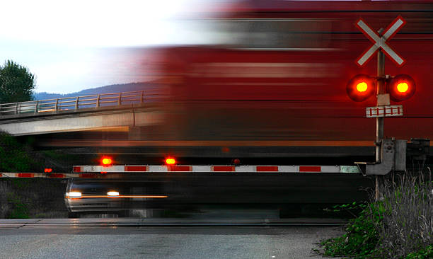 Speeding Train at Railroad Crossing, Motion Blur  railway signal stock pictures, royalty-free photos & images