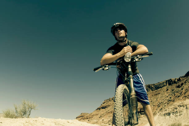 istock Mountain Biker Resting with water bottle 108174370