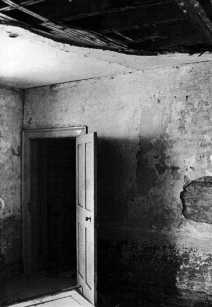 Bicycle parked in an old hallway