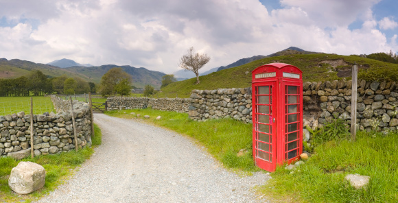 old cabin with public telephone