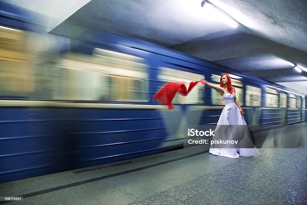 bride in subway station  Blurred Motion Stock Photo