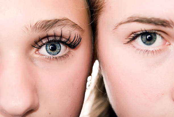 istock Close-up of Two Women's Blue Eyes 108175696