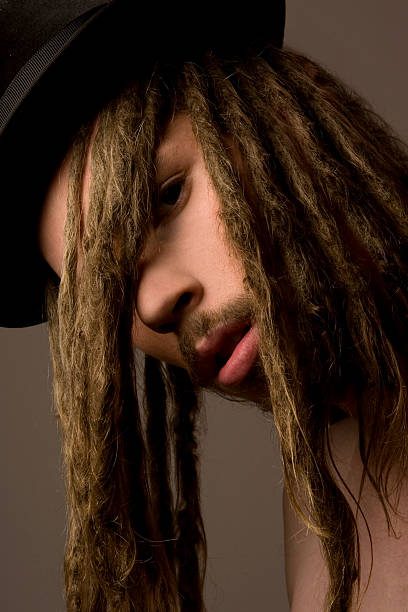 istock Portrait of Man With Dreadlocks Wearing Hat 108175788