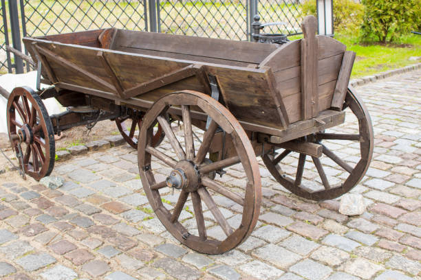 istock Wooden cart on paving stones 1081758022