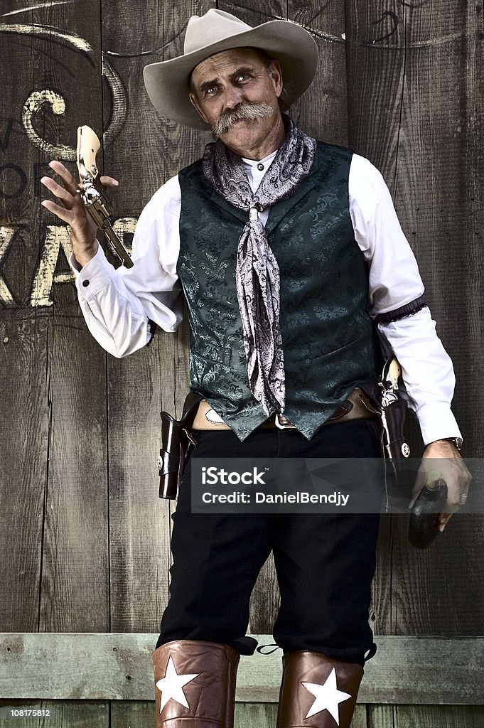 Portrét seniorského kovboje pózujícího - Bez autorských poplatků Divoký západ Stock fotka Portrét seniorského kovboje pózujícího - Bez autorských poplatků Divoký západ Stock fotka