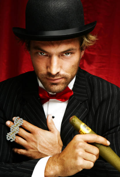 istock Man Wearing Tuxedo Smoking Cigar 108175967