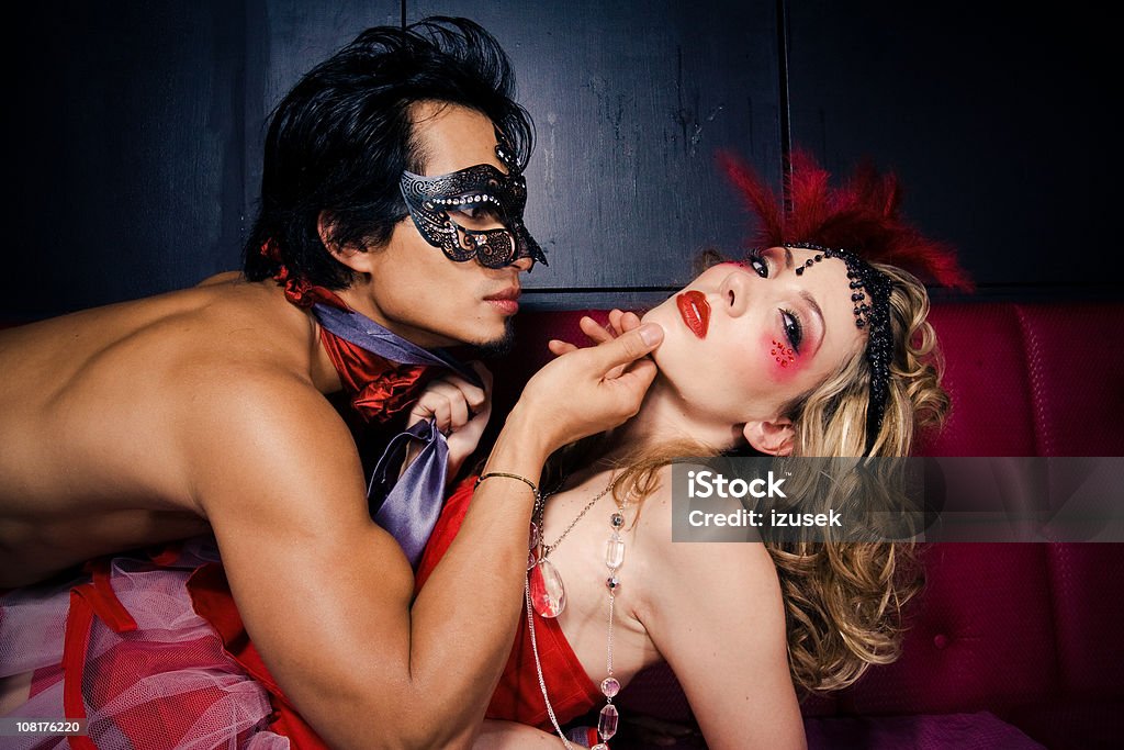 Attraktive junger Mann und Frau im Kostüm - Lizenzfrei Party Stock-Foto