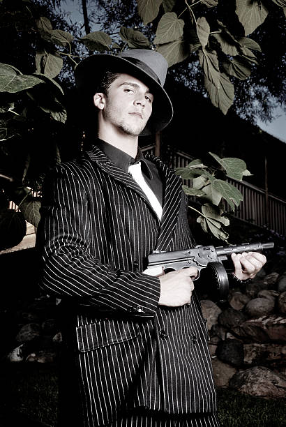 istock Gangster Man Holding Machine Gun 108176267