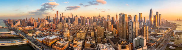 Aerial panorama of New York skyline Aerial panorama of New York skyline above Hudson Yards midtown Manhattan skyscrapers on a sunny afternoon midtown manhattan stock pictures, royalty-free photos & images
