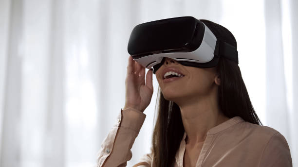 istock Excited girl using VR headset for first time, overwhelmed with positive emotions 1081762786