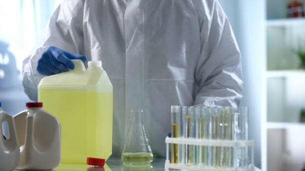 istock Laboratory worker studying biofuel for presence of sediment and additives 1081762930