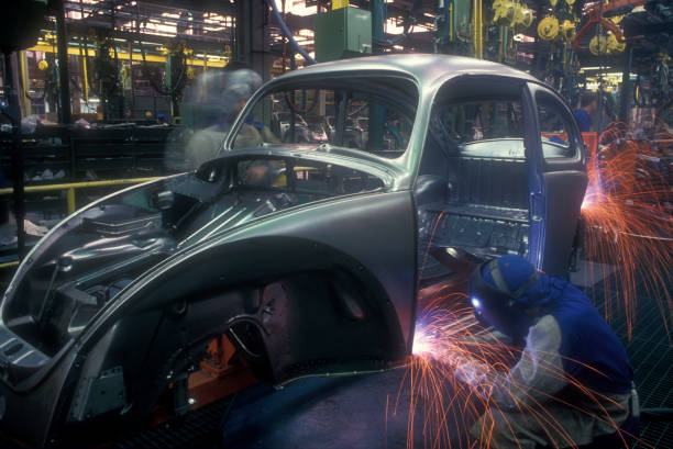istock Welding on an assembly line in an automotive factory 108176424