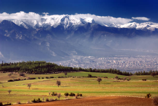 istock Green Fields and Snowy Mountains, Denizli, Turkey 108176576