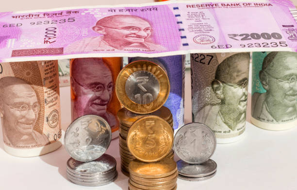 istock Image of indian currency notes and coins 1081768628