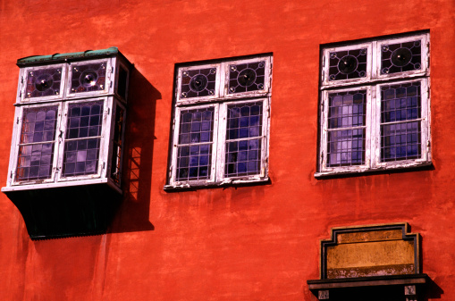 Red Shuttered Windows On A Red Wall - Seen In Friuli