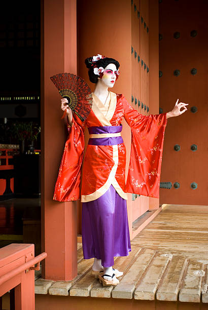 istock Geisha Woman Posing in Temple 108176939