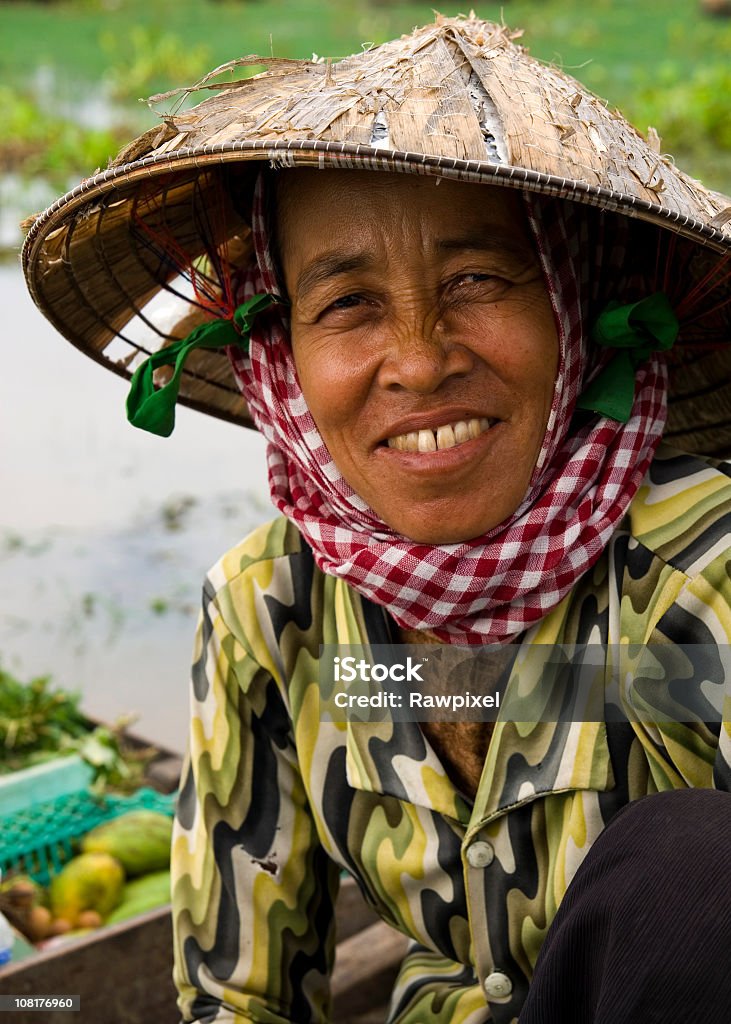 Cambodian Woman in Boat  Cambodia Stock Photo