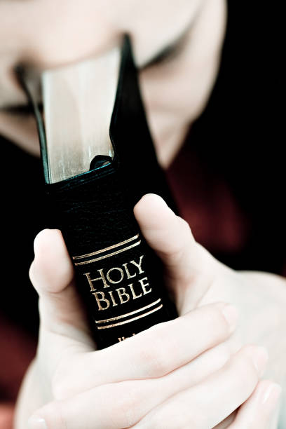 Holy Bible and LGBT heart sign