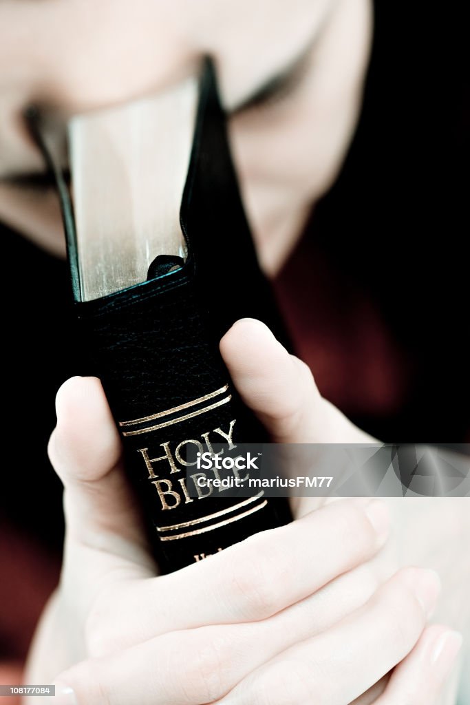 Woman's Hands on Holy Bible  Bible Stock Photo